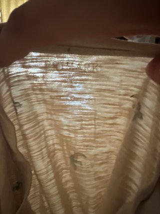 Camiseta corta beige con tucanes