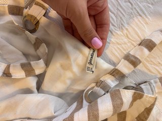 Mono rayas beige y blanco Stradivarius