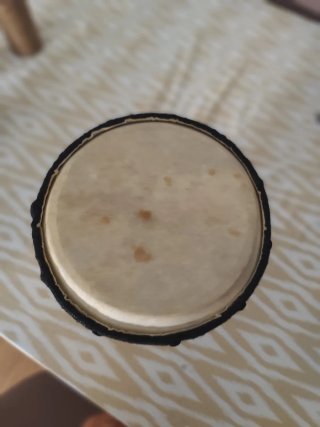 Yembé de madera tallada