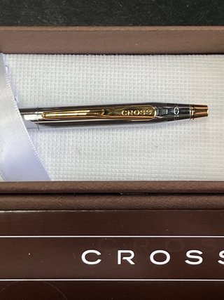 Bolígrafo Cross plateado y dorado