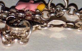 Pulsera de Plata con Dijes de Niña