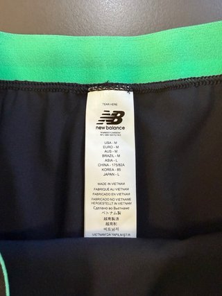Bermuda New Balance M Nero/Verde