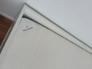 Cama nido IKEA blanca con colchón incluido.