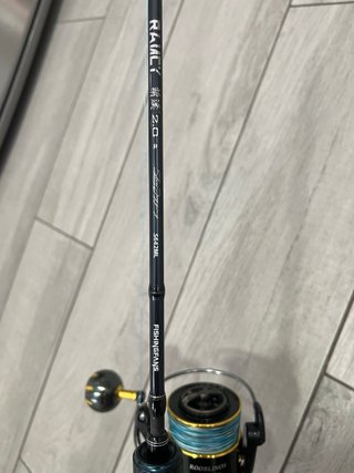 Caña de pescar y carrete de jigging