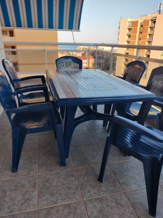 Conjunto mesa y 6 sillas jardín plástico