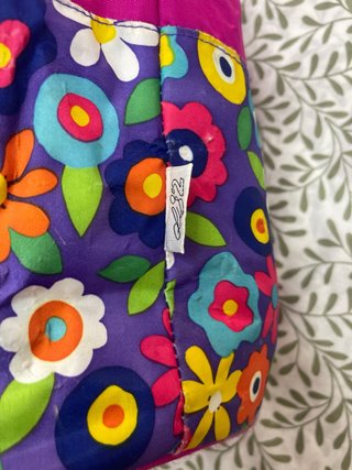 Mochila saco fucsia y floral