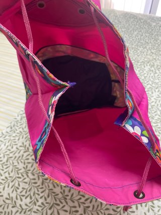 Mochila saco fucsia y floral