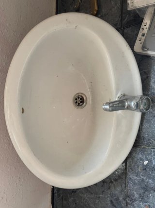 Lavabo de porcelana blanco