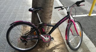 Bicicleta BTWIN rosa y negra