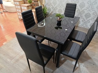 Mesa de cristal con 6 sillas polipiel