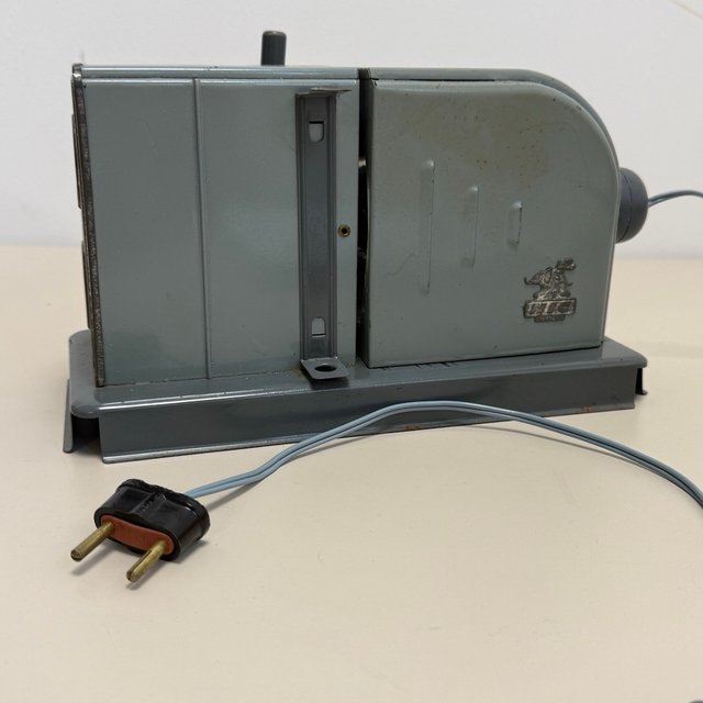 Antiguo cine proyector NIC con 31 peliculas y caja