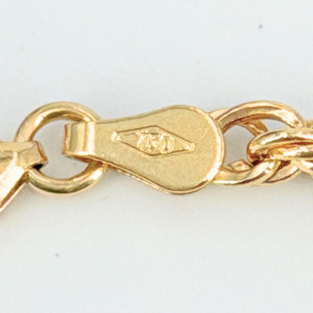 Cadena Salomónica de oro de 18k, 10.19 g, 62.5 cm.