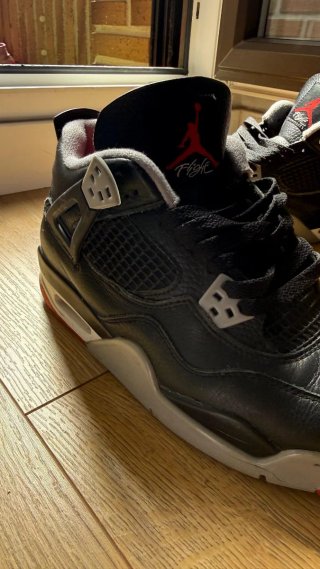 Jordan 4 Reimagined Negro/Rojo