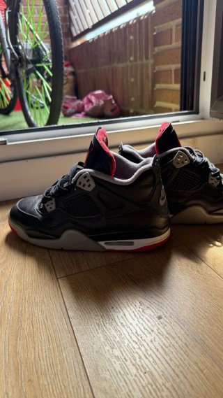 Jordan 4 Reimagined Negro/Rojo