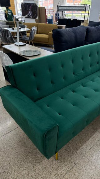 Sofá esquinero verde de terciopelo