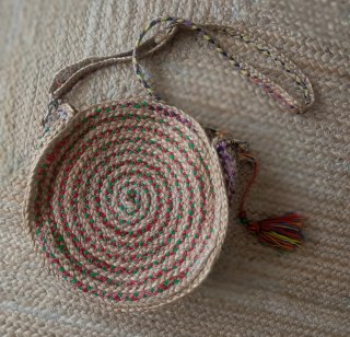 Bolso redondo tejido multicolor