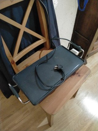 Plancha eléctrica negra
