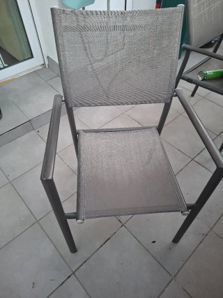 Mesa de jardín cristal y metal y 6 sillas.