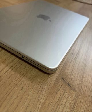 MacBook Neo Plata  256 gb 8 de ram con cargador