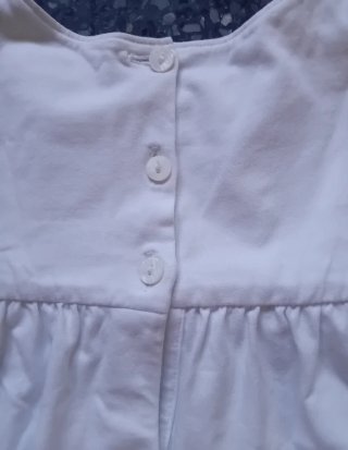 Maglietta bambina bianco con fiocchi rosa