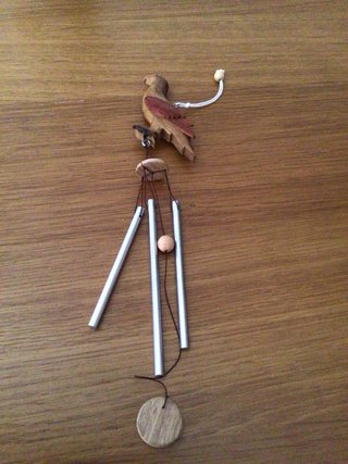 Scacciapensieri in legno e metallo
