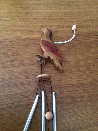 Scacciapensieri in legno e metallo