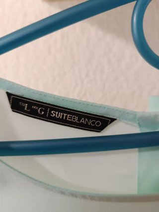 Blusa manga corta con volantes
