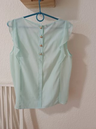 Blusa manga corta con volantes