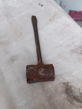 Llave de bujía antigua con destornillador