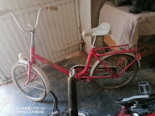 Bicicleta plegable rosa