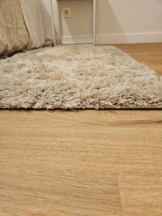 2 Alfombras de dormitorio beiges