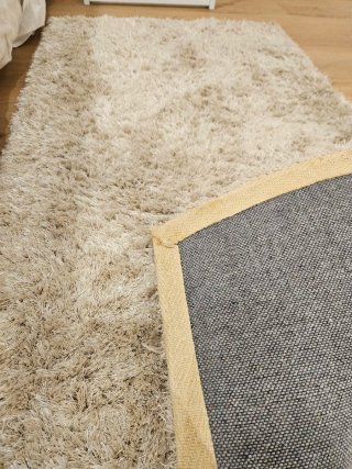 2 Alfombras de dormitorio beiges