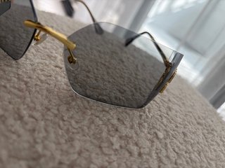 Gafas de sol Miu Miu doradas y grises
