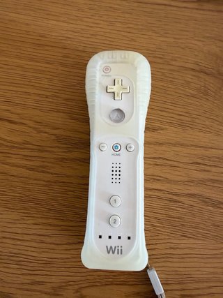 Consola Wii + Mando (falta cable corriente)