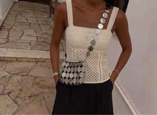 Bolso de fiesta con círculos plateados