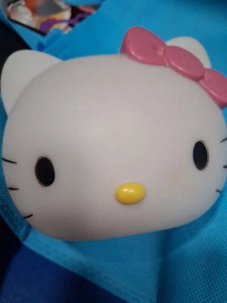 Hello Kitty.Chaqueta M Rojo naranja y lámpara led