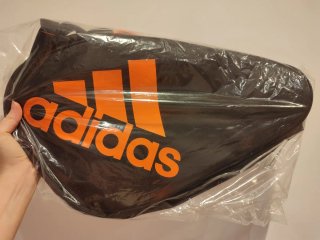 Paletero Adidas Negro y Naranja