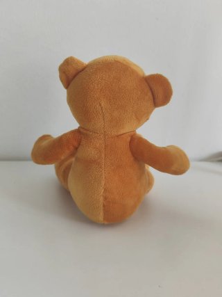 Osito de peluche marrón y blanco