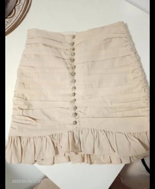 Minifalda Zara drapeada beige Talla XS
