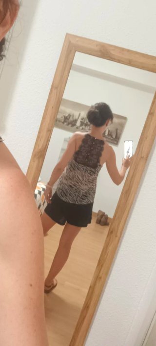 Top animal print con encaje negro