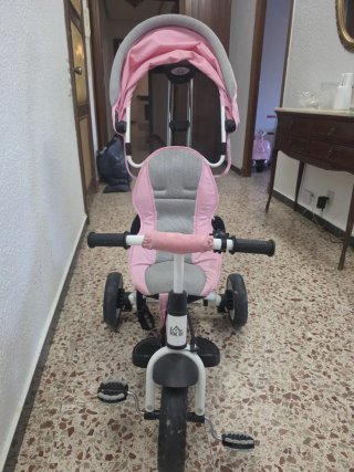 Triciclo evolutivo infantil rosa con capota