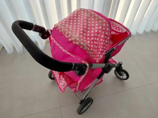 Cochecito de muñecas rosa con muñeca Nenuco