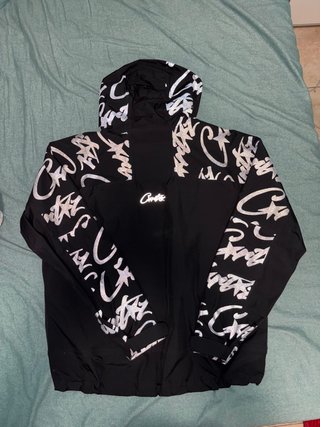 Chaqueta Cortavientos Corteiz Reflectante Negra