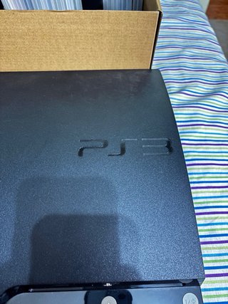PlayStation 3 + 2 mandos + 12 juegos