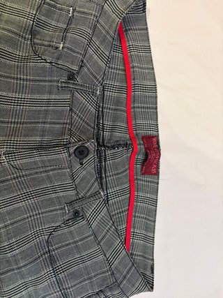 Pantalones pitillo de cuadros grises y negros