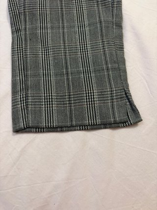 Pantalones pitillo de cuadros grises y negros