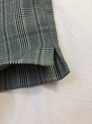 Pantalones pitillo de cuadros grises y negros