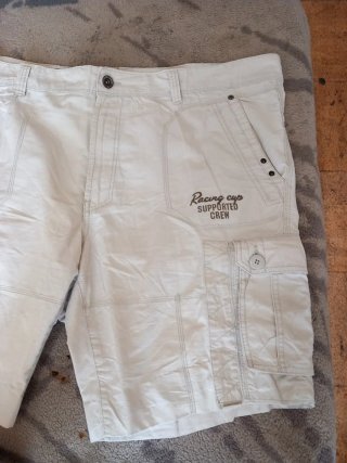 Pantalón corto;De Angelo Litrico.Talla 62 Blanco