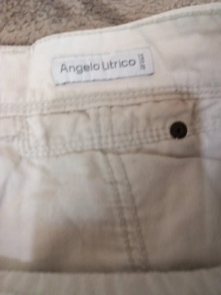 Pantalón corto;De Angelo Litrico.Talla 62 Blanco
