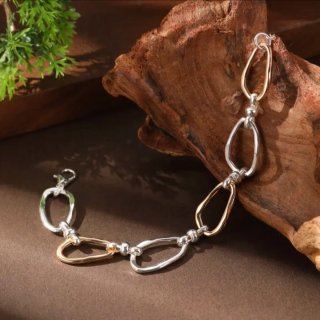 Pulsera eslabones dorados y plateados